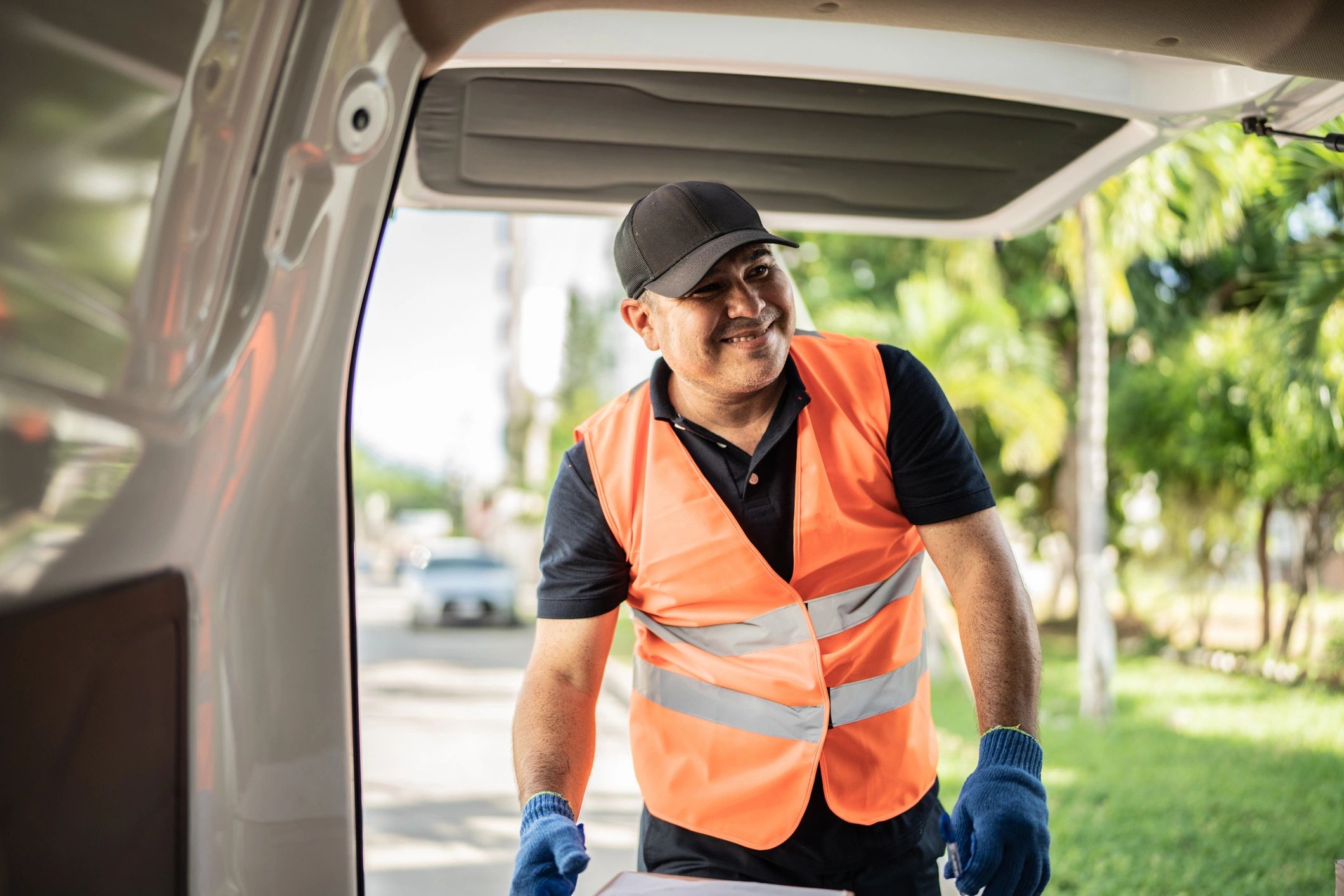 Delivery professional working at a van
